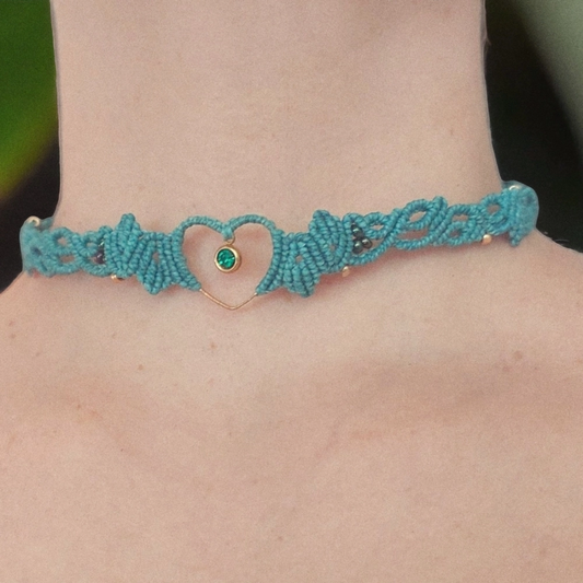 Boho macrame choker features a lovely Rhinestone charm. This necklace is the perfect statement piece for any hippie-style outfit. This versatile piece can be worn as a crew neck necklace or even as a tiara.