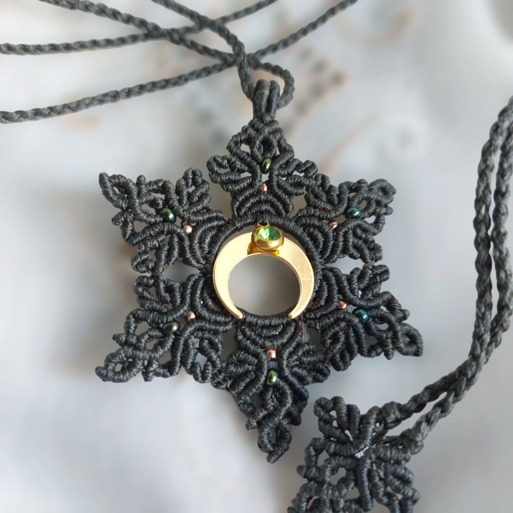 The boho macrame mandala features a lovely crescent moon charm plated with 18K gold and a green Stainless Steel Rhinestone charm