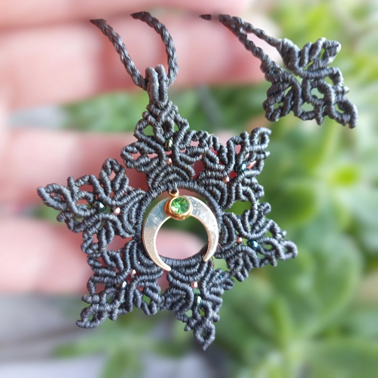 The boho macrame mandala features a lovely crescent moon charm plated with 18K gold and a green Stainless Steel Rhinestone charm