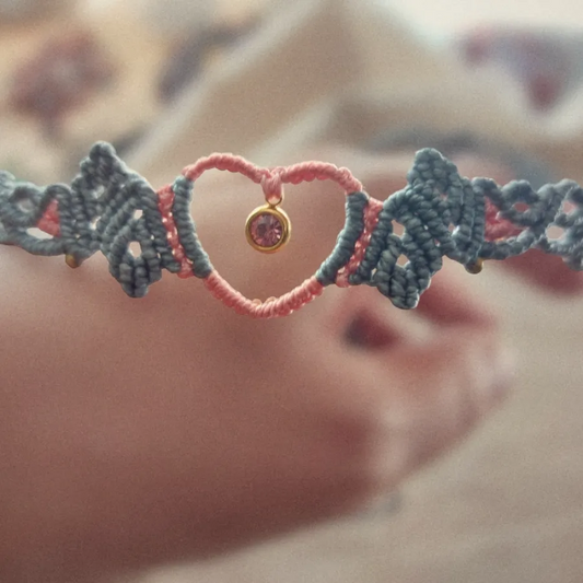 The boho macrame choker features a lovely Rhinestone charm. This necklace is the perfect statement piece for any hippie-style outfit. This versatile piece can be worn as a crew neck necklace or even as a tiara