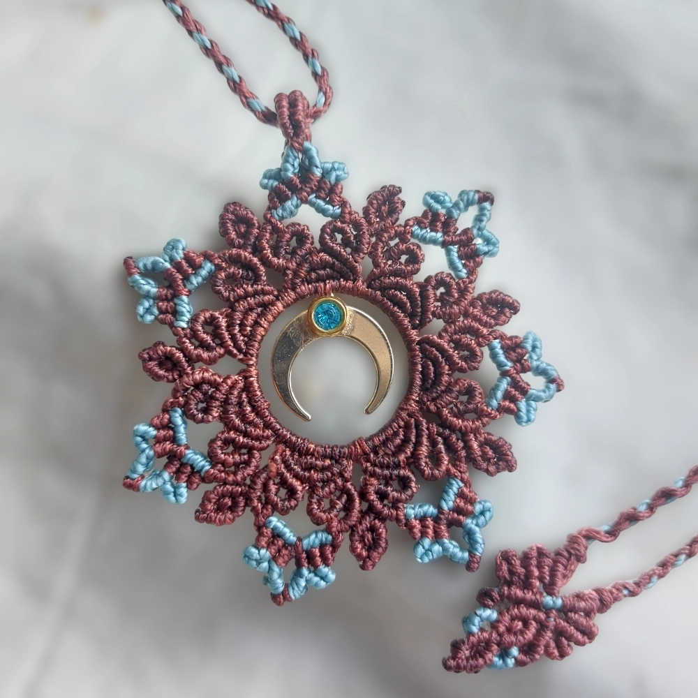 The boho macrame mandala features a lovely crescent moon charm plated with 18K gold and a Stainless Steel Rhinestone charm With an adjustable length of approximately 53cm/21 inches, including the pendant, this necklace can be easily adjusted to fit any neck with a convenient slide lock