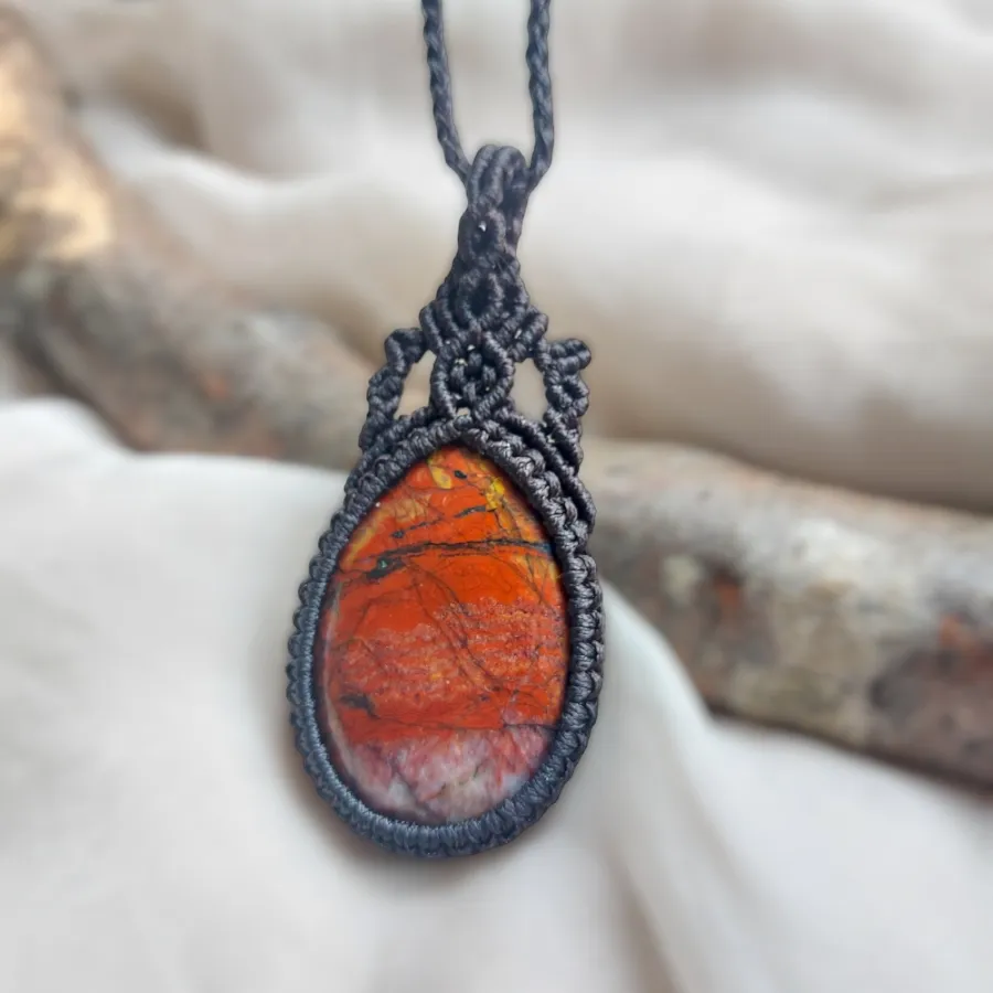African Macrame Necklace is a stunning statement piece that features an 82ct AAA quality gemstone  With an adjustable length of approximately 53cm/21 inches, including the pendant, this necklace can be easily adjusted to fit any neck with a convenient slide lock feature.
