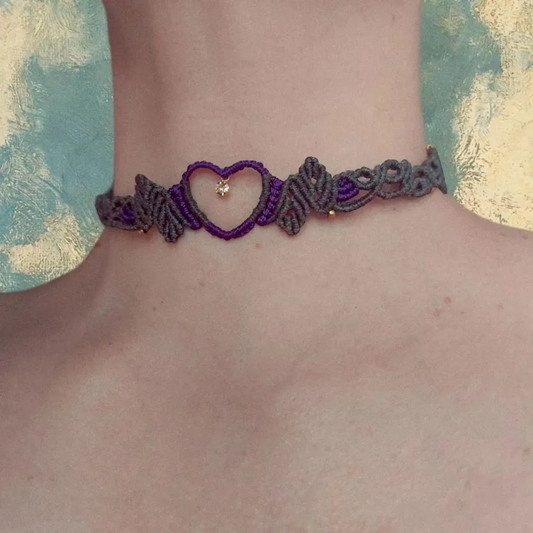purple choker  rhinestone pendant encased within a heart-shaped brass setting