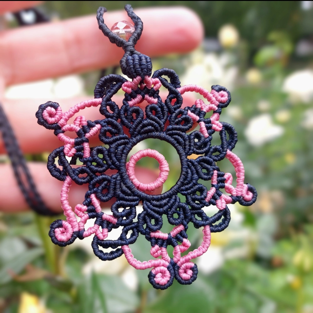 Unique boho necklace with a handcrafted mandala design and glass bead topper