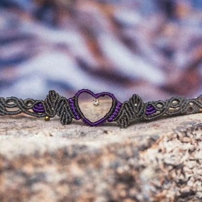 purple choker rhinestone pendant encased within a heart-shaped brass setting