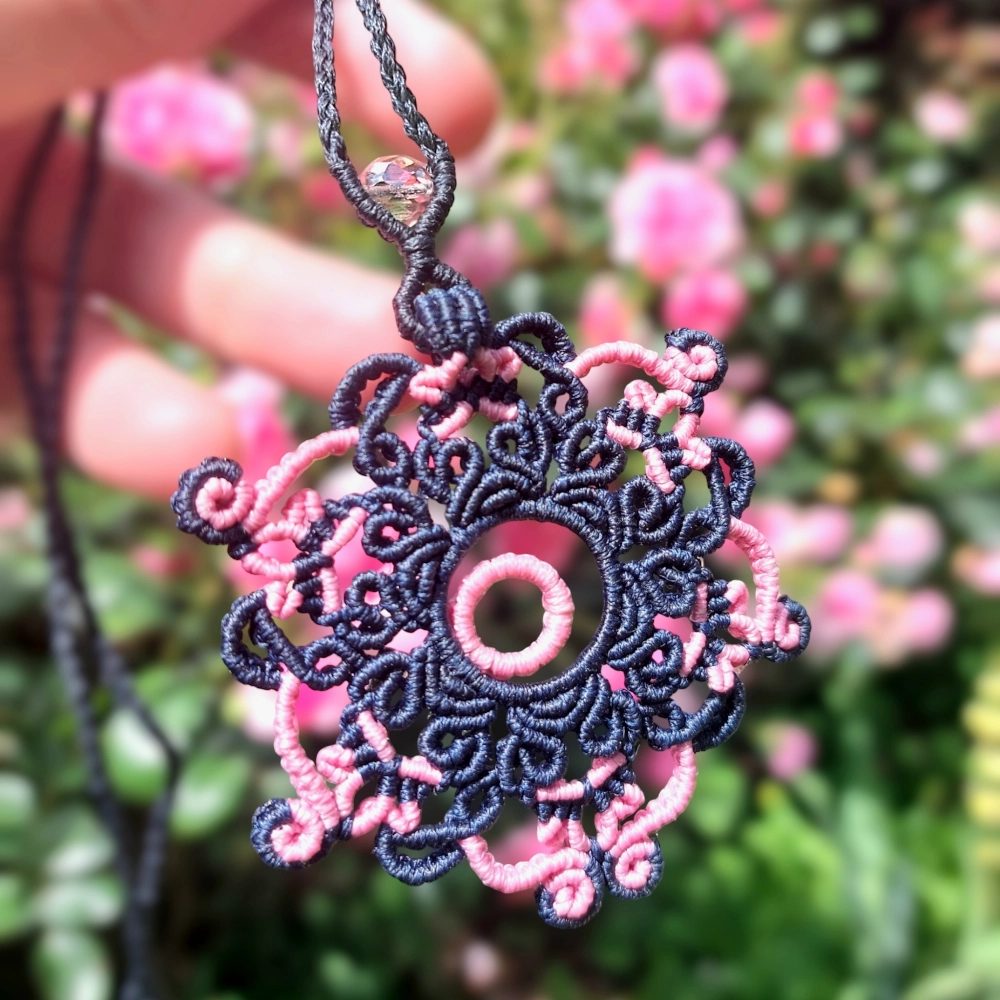 Unique boho necklace with a handcrafted mandala design and glass bead topper