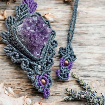 A raw Amethyst pendant that boasts a unique design. This statement necklace features a beautiful amethyst druzy cluster that is raw and unpolished, giving it a natural and earthy feel.