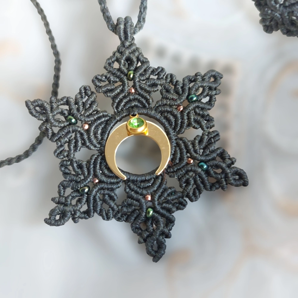 The boho macrame mandala features a lovely crescent moon charm plated with 18K gold and a green Stainless Steel Rhinestone charm 