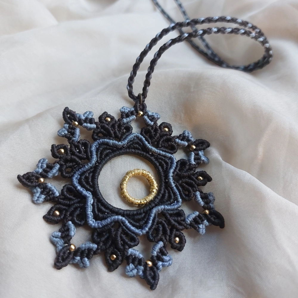 gold, brown and light blue macrame mandala pendant