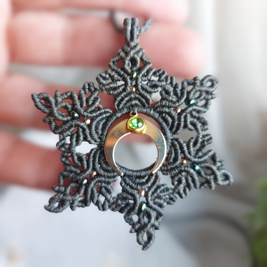 The boho macrame mandala features a lovely crescent moon charm plated with 18K gold and a green Stainless Steel Rhinestone charm 