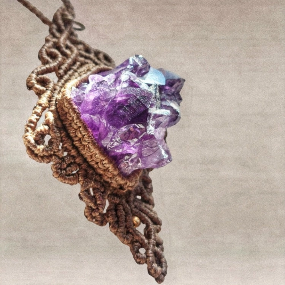 This Handmade Macrame Raw Amethyst Crystal Cluster Necklace is a unique and beautiful piece of jewelry that is perfect for anyone who loves natural gemstones and boho style. 
