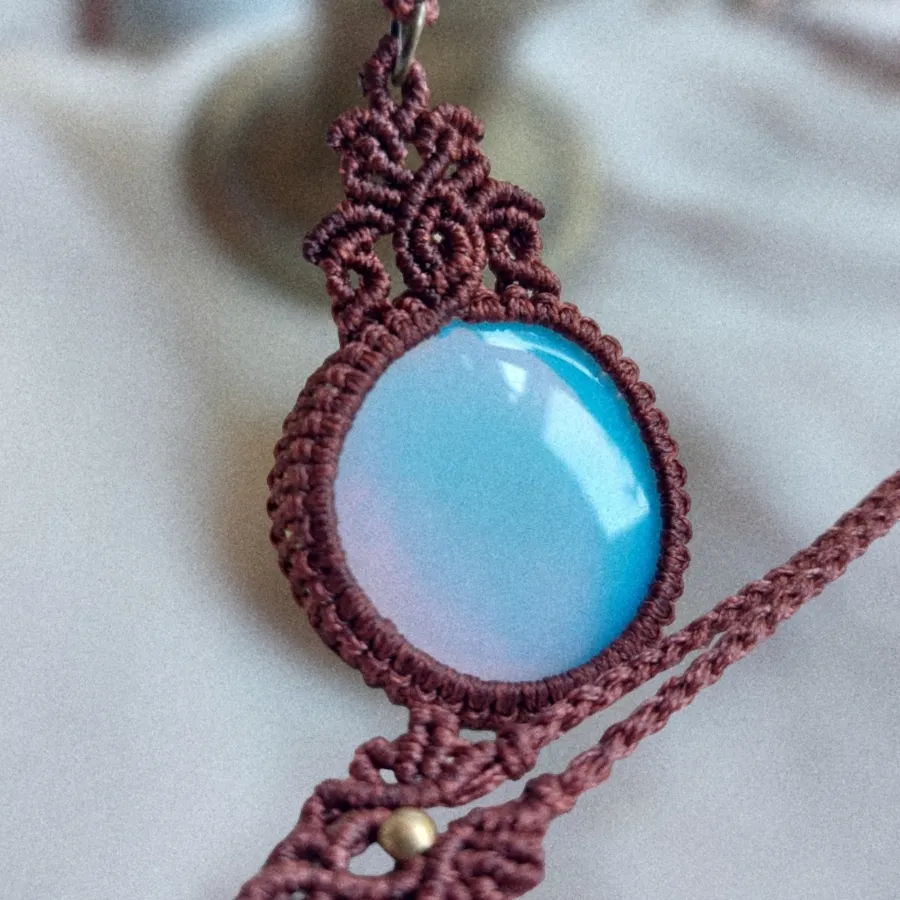 This handcrafted pendant is made with natural Asymmetrical Opalite and brass beads  The total length of the necklace, including the pendant, measures approximately 56cm /22 inches and it is adjustable to fit your preferred length with a convenient slide lock