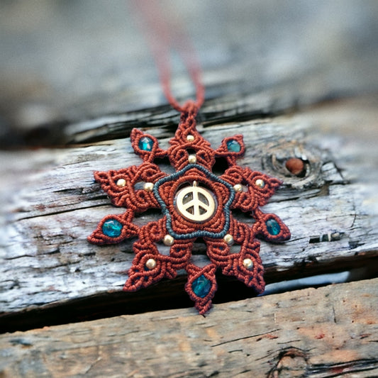 The Macrame Mandala Necklace features a peace symbol charm and brass beads. Measuring approximately 55cm /21.8 Inches in total length, the necklace is adjustable with a slide lock for a comfortable fit.