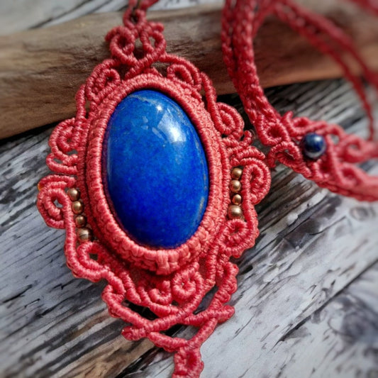 his is a beautiful and unique macrame necklace made using a stunning lapis lazuli cabochon pendant. The pendant is surrounded by shining copper beads that are strung together using the macrame technique. The total length of the necklace, including the pendant, measures approximately 53cm/21 inches and it is adjustable to fit your preferred length with a convenient slide lock.  The size of the stone is: 4.5cmx3cm