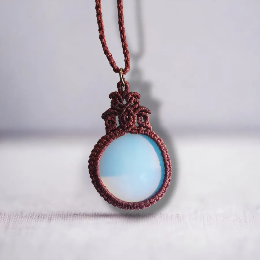 This handcrafted pendant is made with natural Asymmetrical Opalite and brass beads  The total length of the necklace, including the pendant, measures approximately 56cm /22 inches and it is adjustable to fit your preferred length with a convenient slide lock